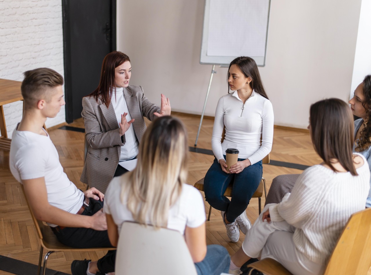 close-up-people-sitting-circle