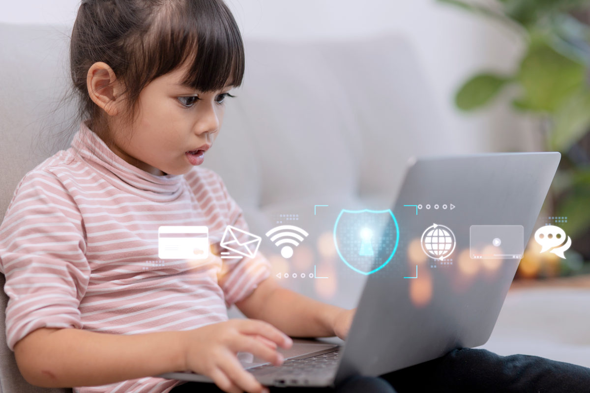 child-safety-online-little-girl-using-laptop-home-icon-internet-blocking-app-foreground